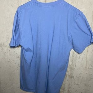 Blue supreme t shirt.